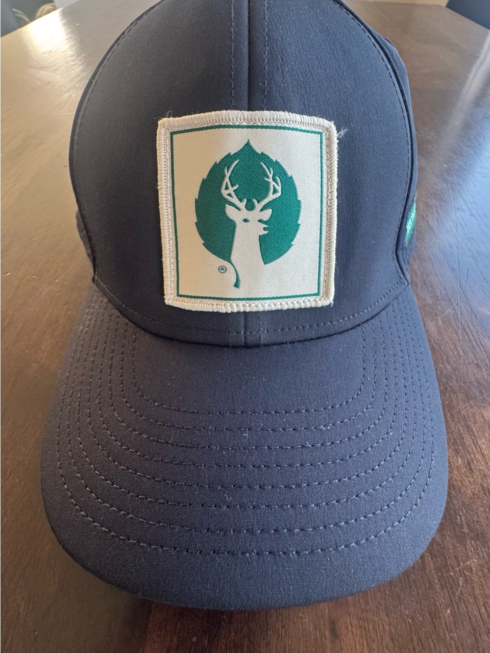 Deer Valley Hat Black snap Cap with Green Deer Patch